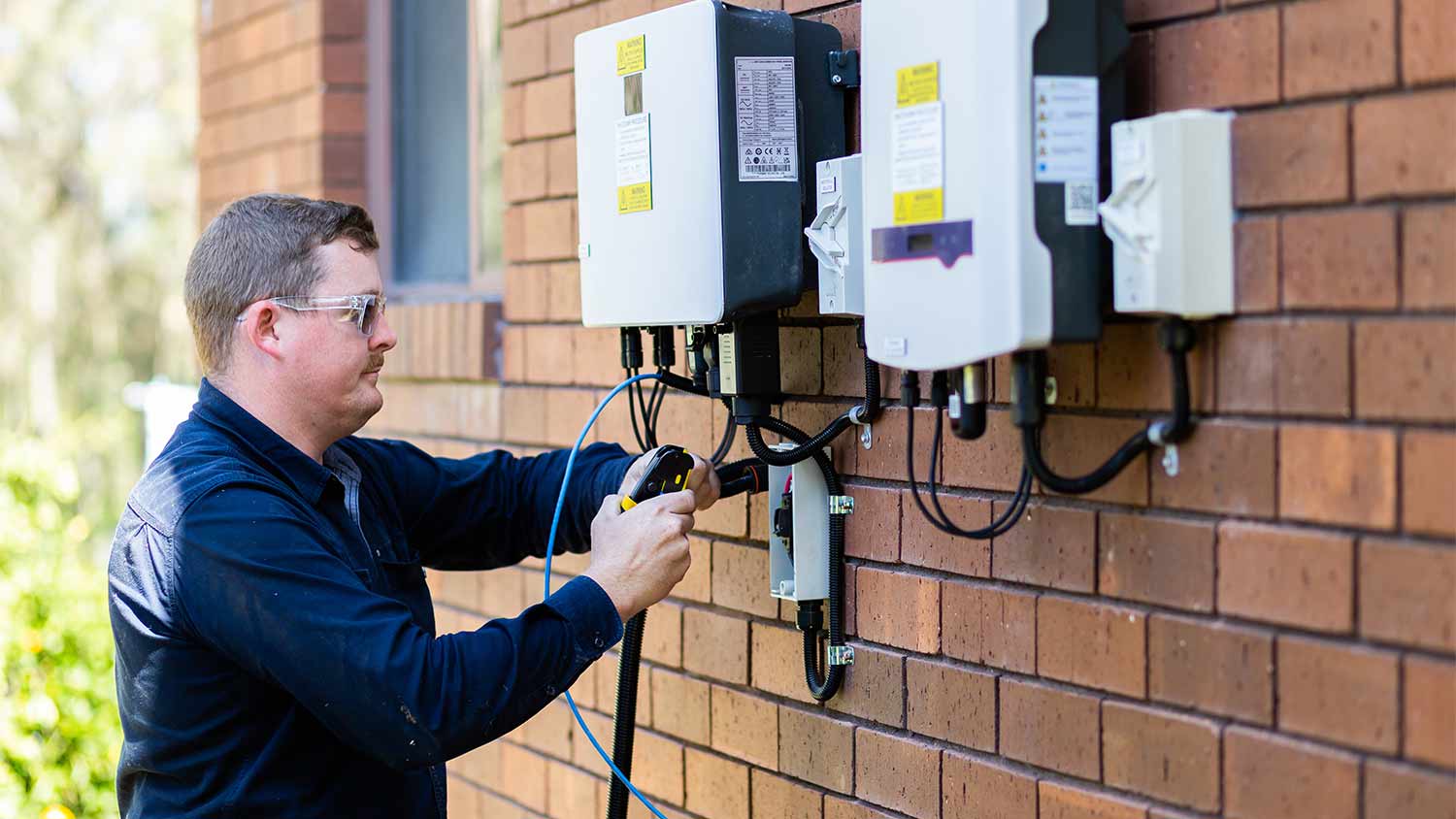 electrician installing solar power connection