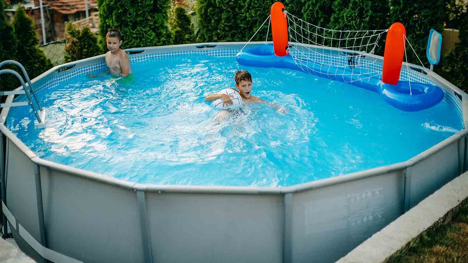 boys playing in above ground pool