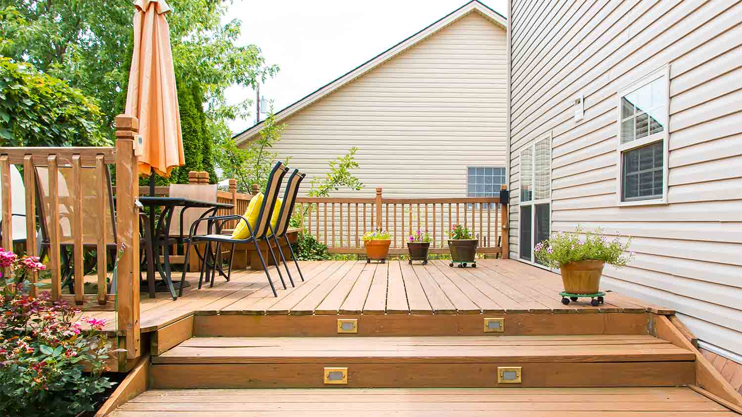 modern wooden deck attached to house