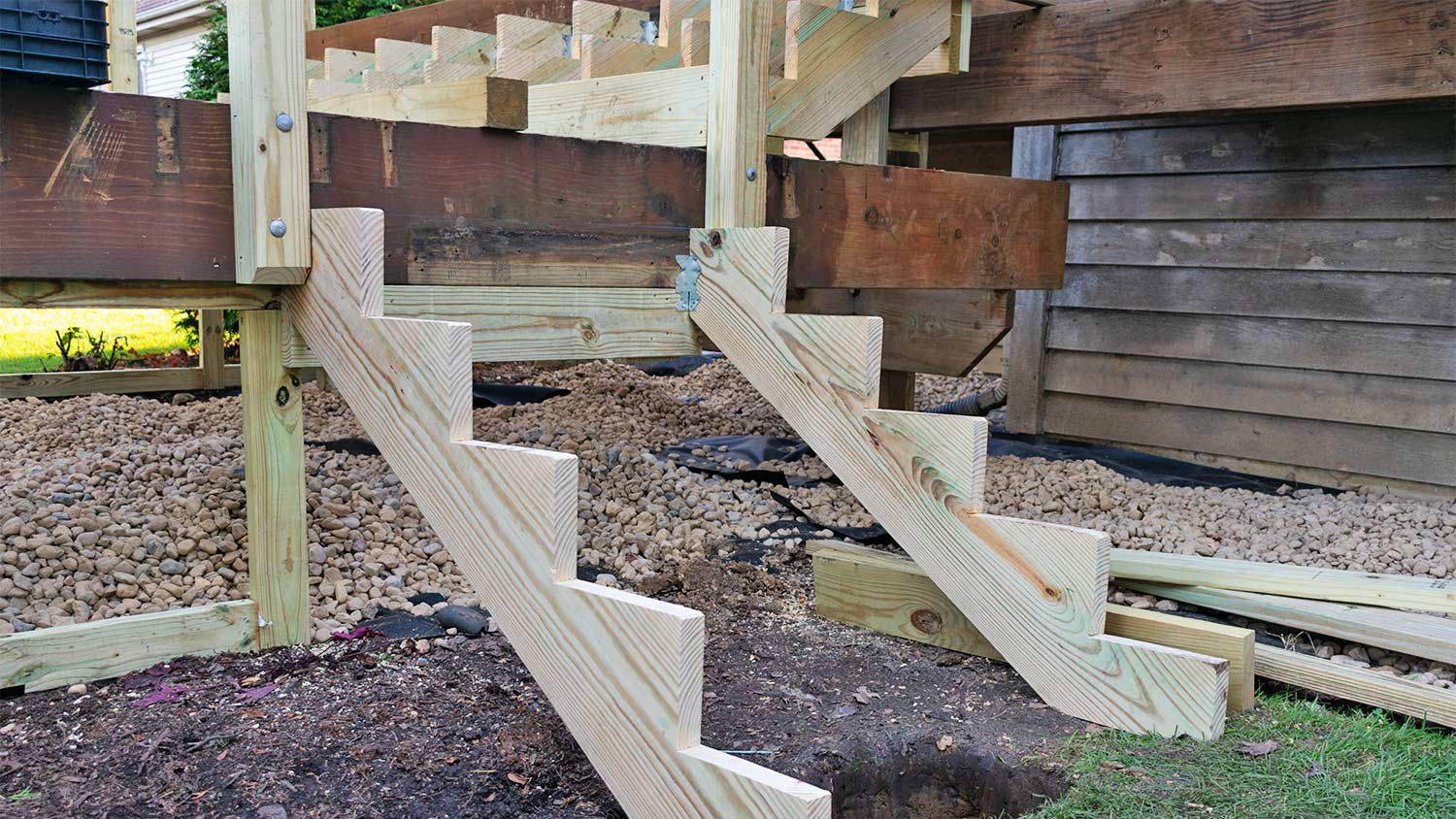 Structure of New Stairs being Constructed on a Backyard Home Deck