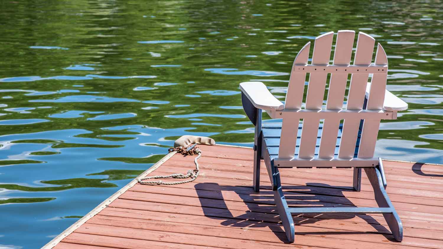 An Adirondack style chair on a floating dock