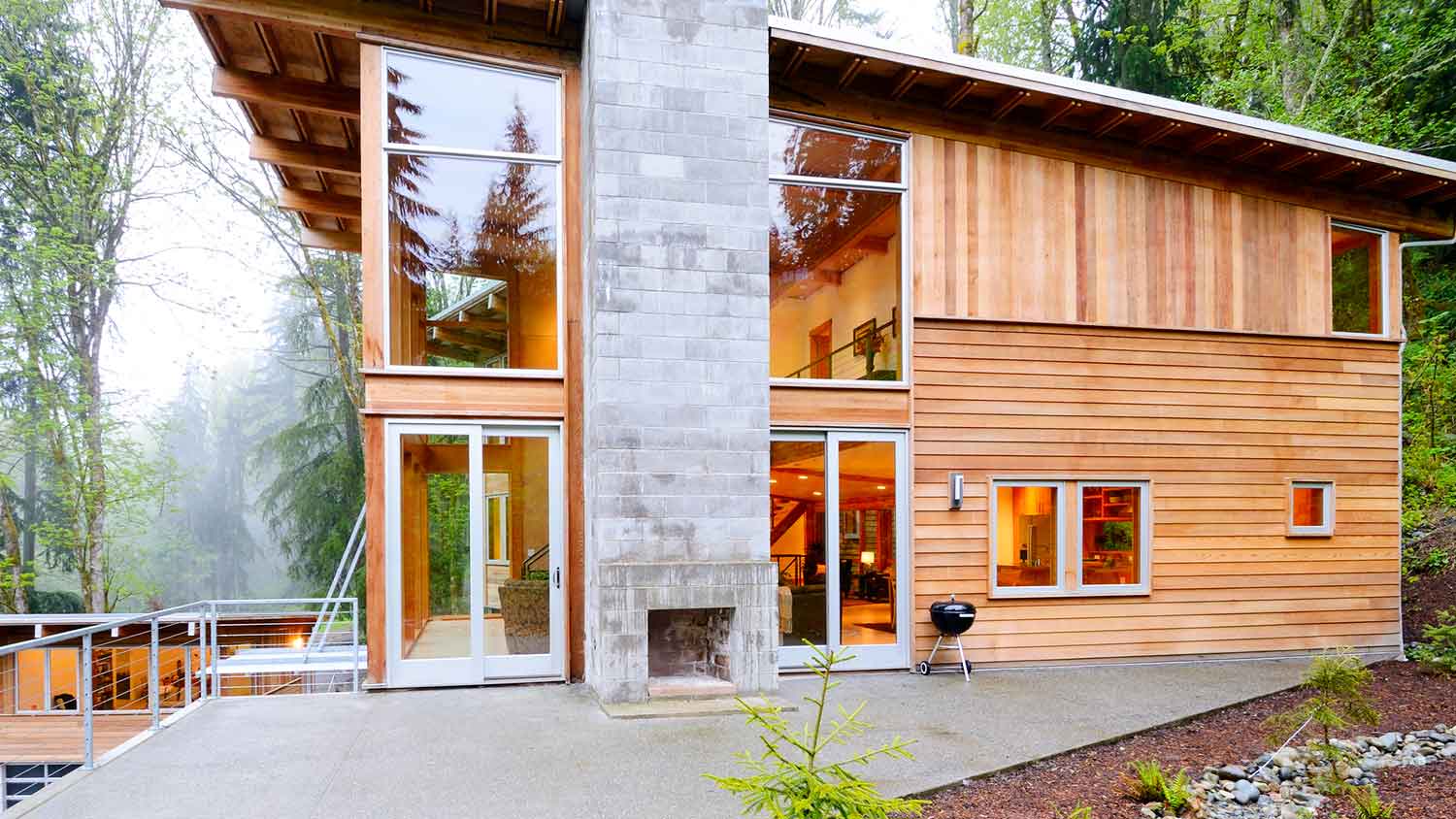 Modern house with concrete and wooden siding
