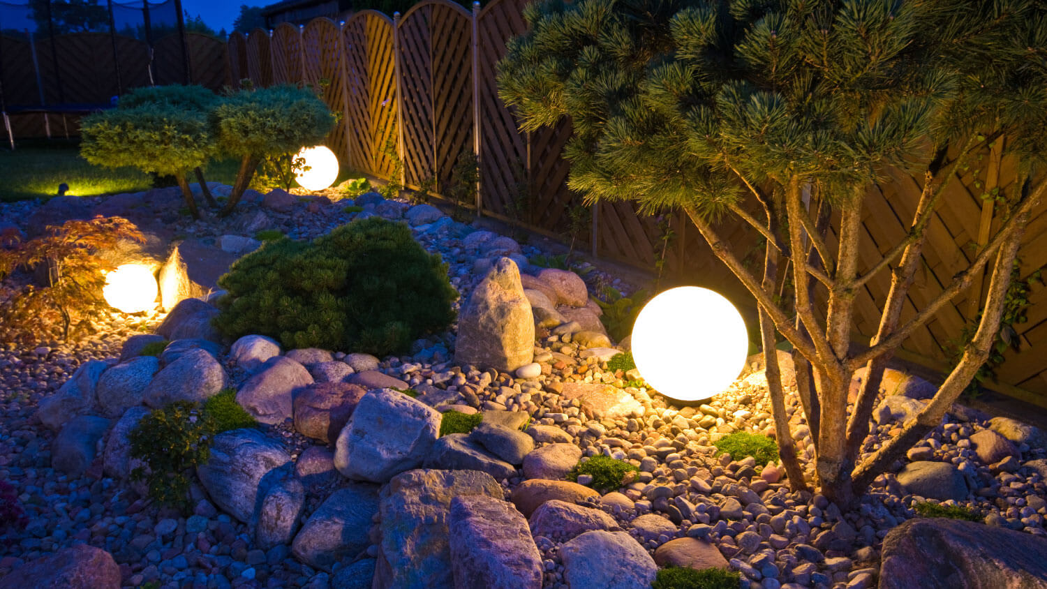 illuminating rock garden with round lights