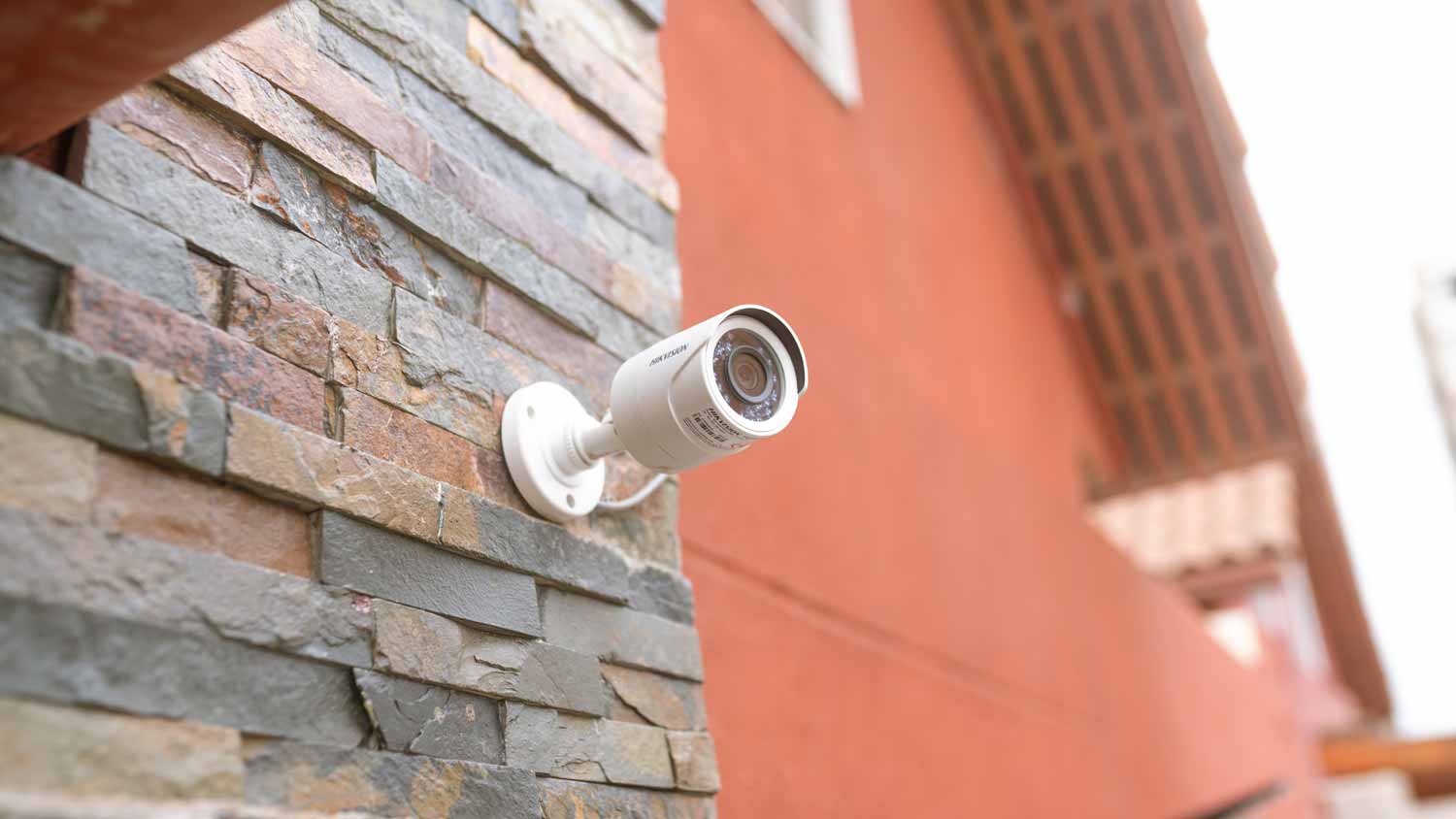 A CCTV camera installed on the exterior of a house