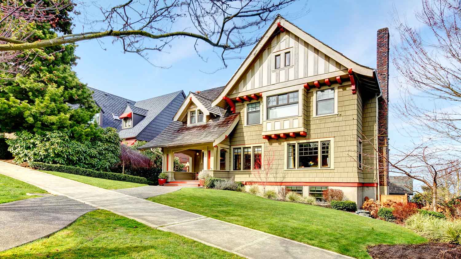 House with shingle siding and a chimney
