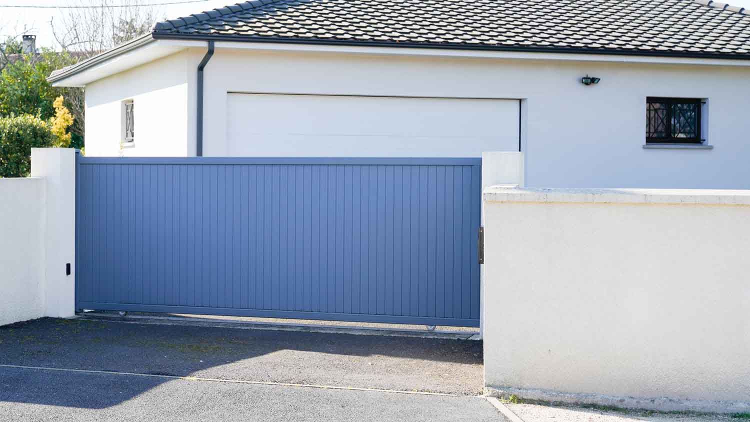 A blue sliding gate