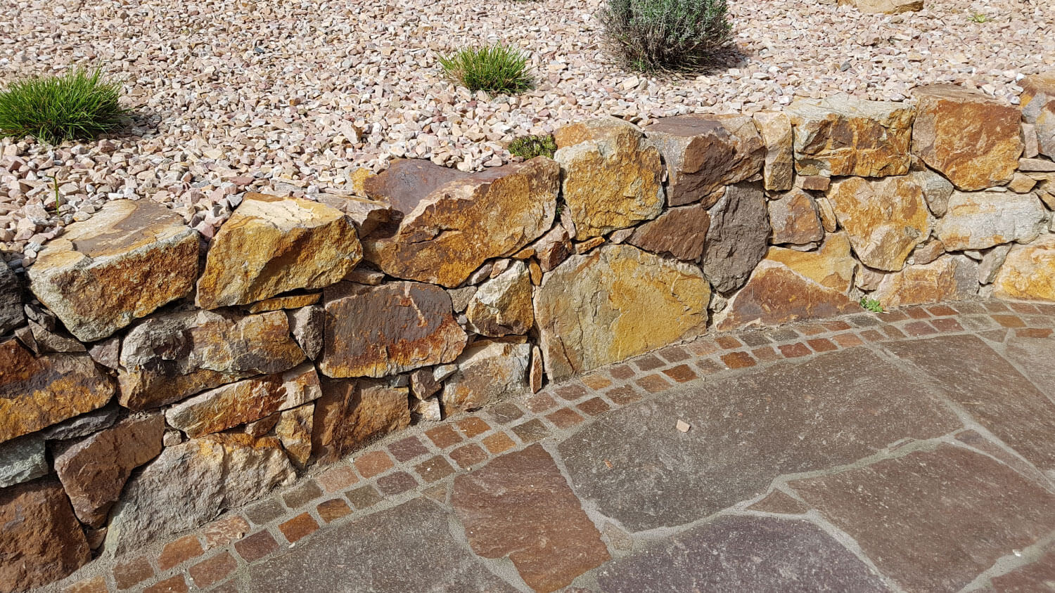 rock retaining wall in garden