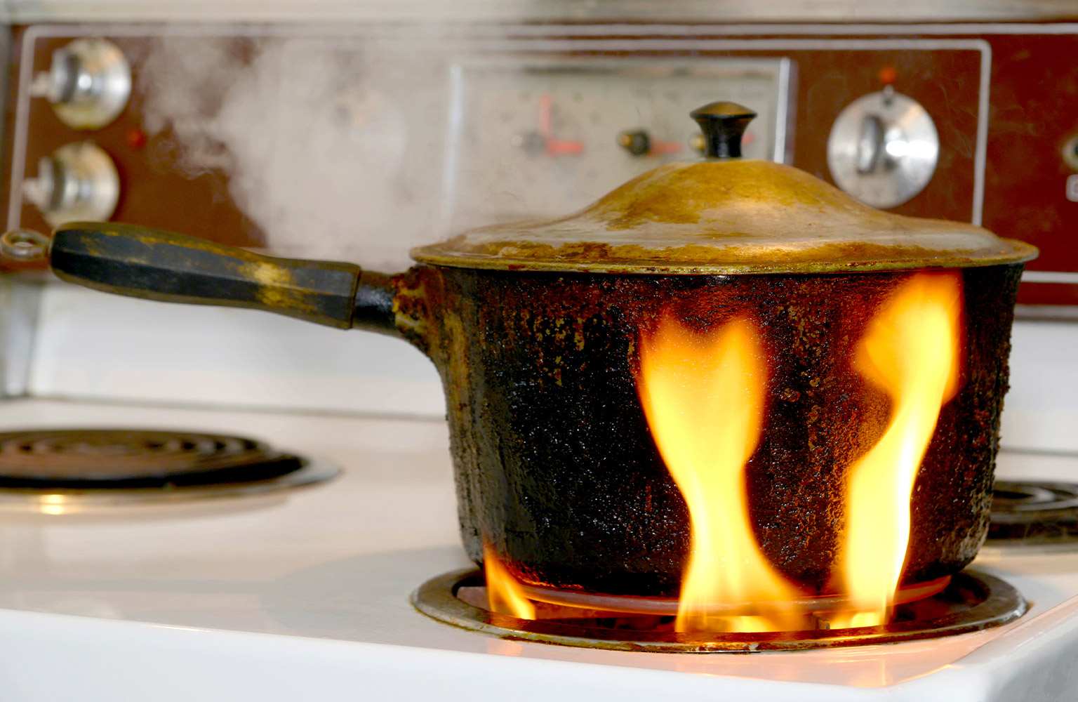 pot catching on fire in the kitchen