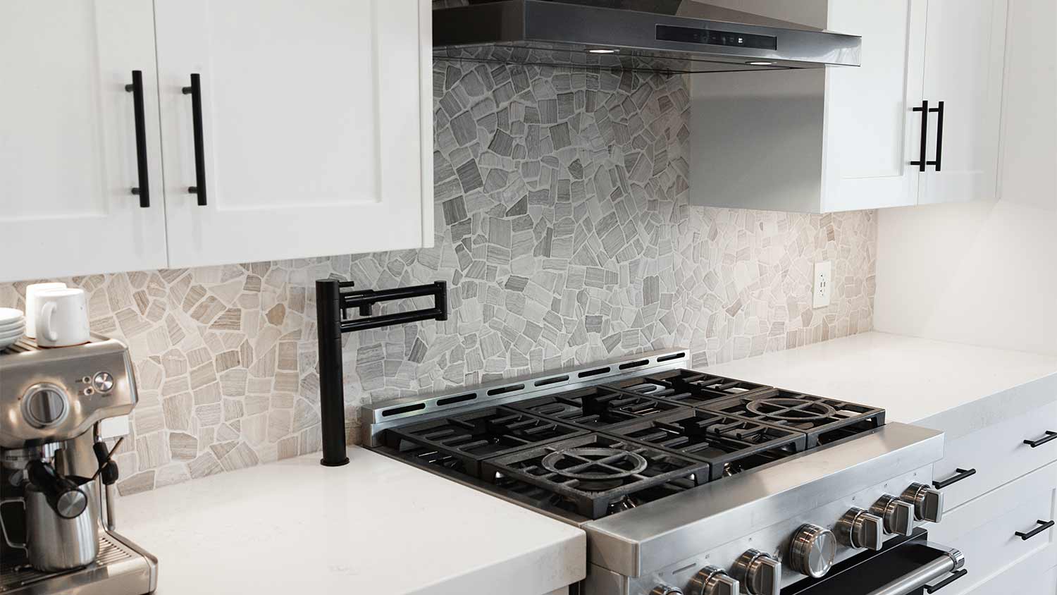 white kitchen with non vented range hood