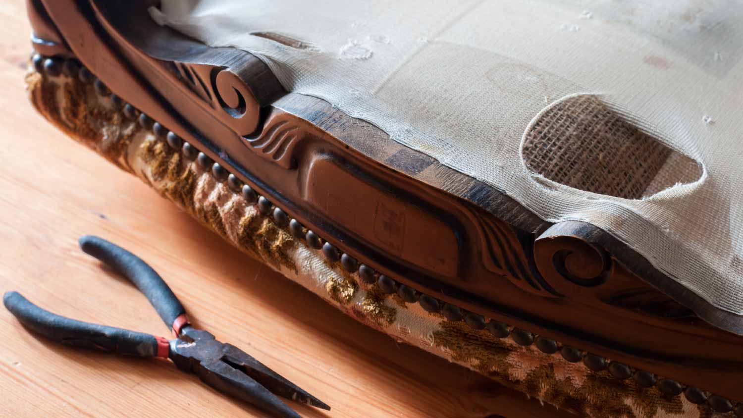 An old upholstered wood chair to restore