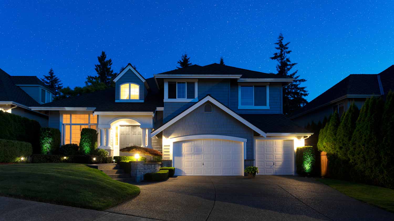 The exterior of a beautiful house at late evening