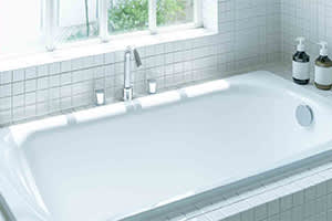 all white bathroom with tub