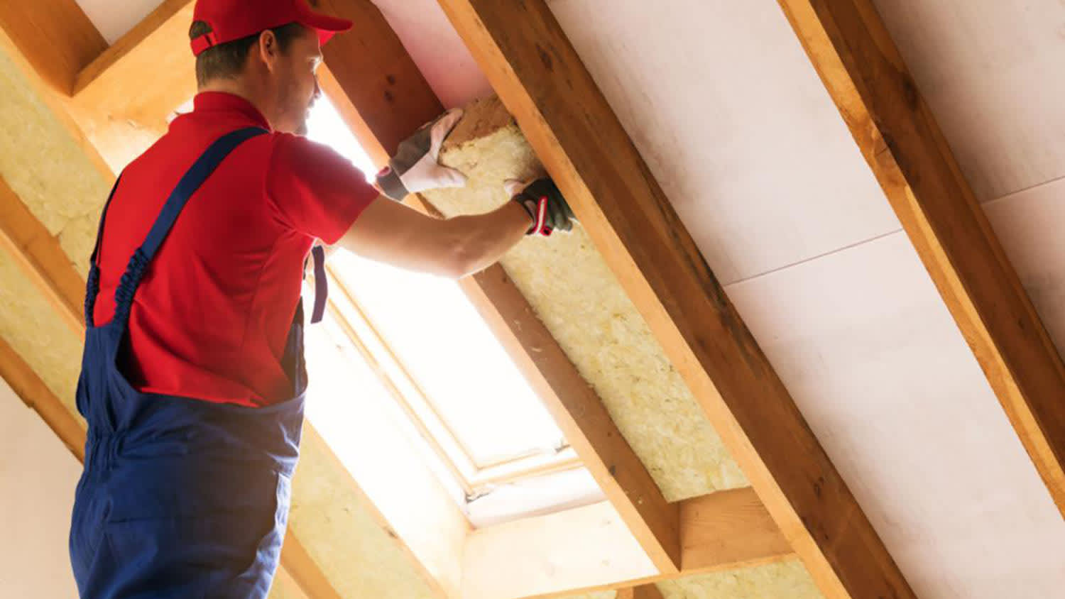 handyperson working on ceiling