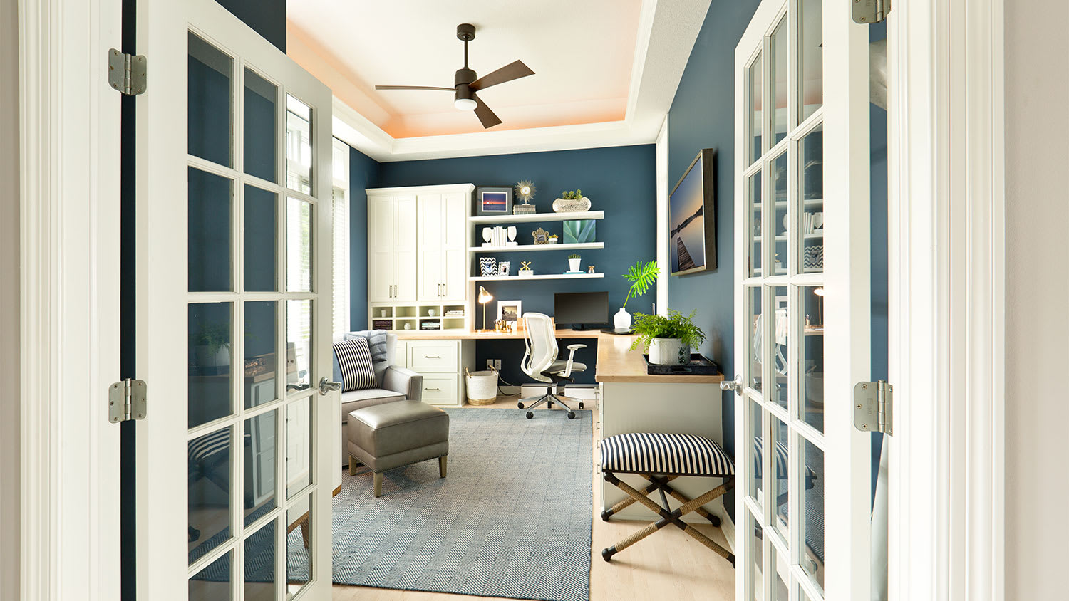 Modern home office with ceiling fan