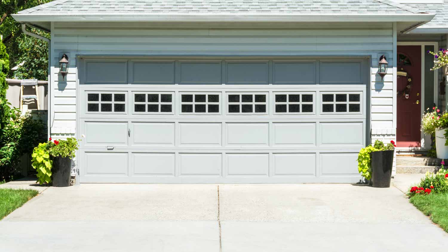 A garage and concrete driveway
