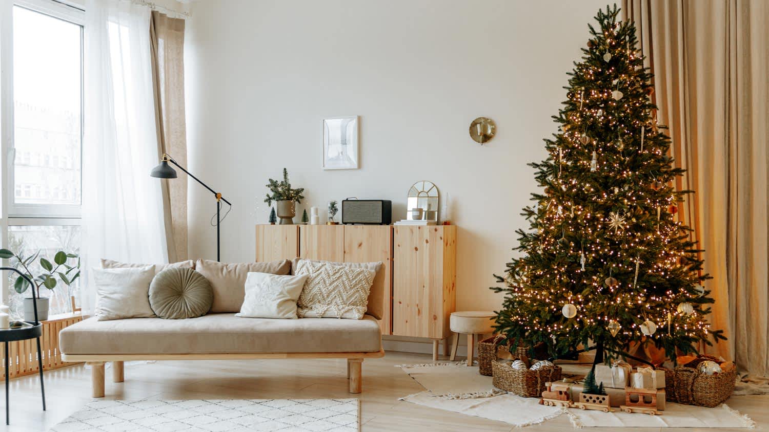 A Christmas spruce tree in a scandinavian living room