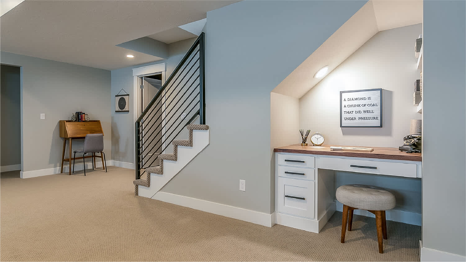 built in desk under stairs in basement