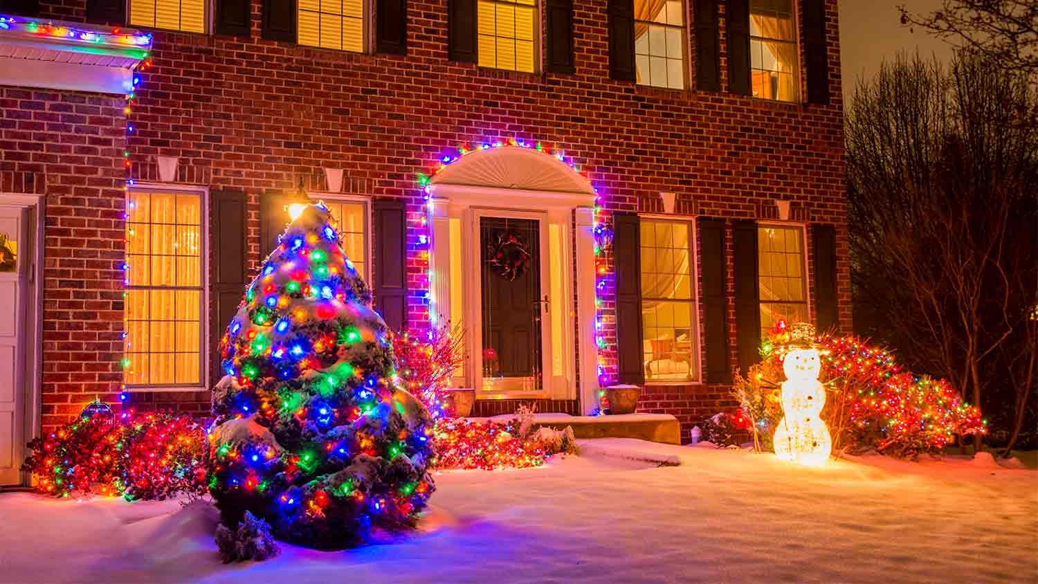 House decorated with colorful lights for Christmas