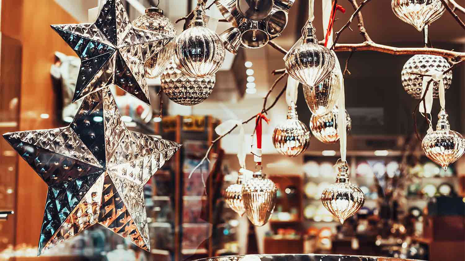 A view of christmas tree decorations in a storefront