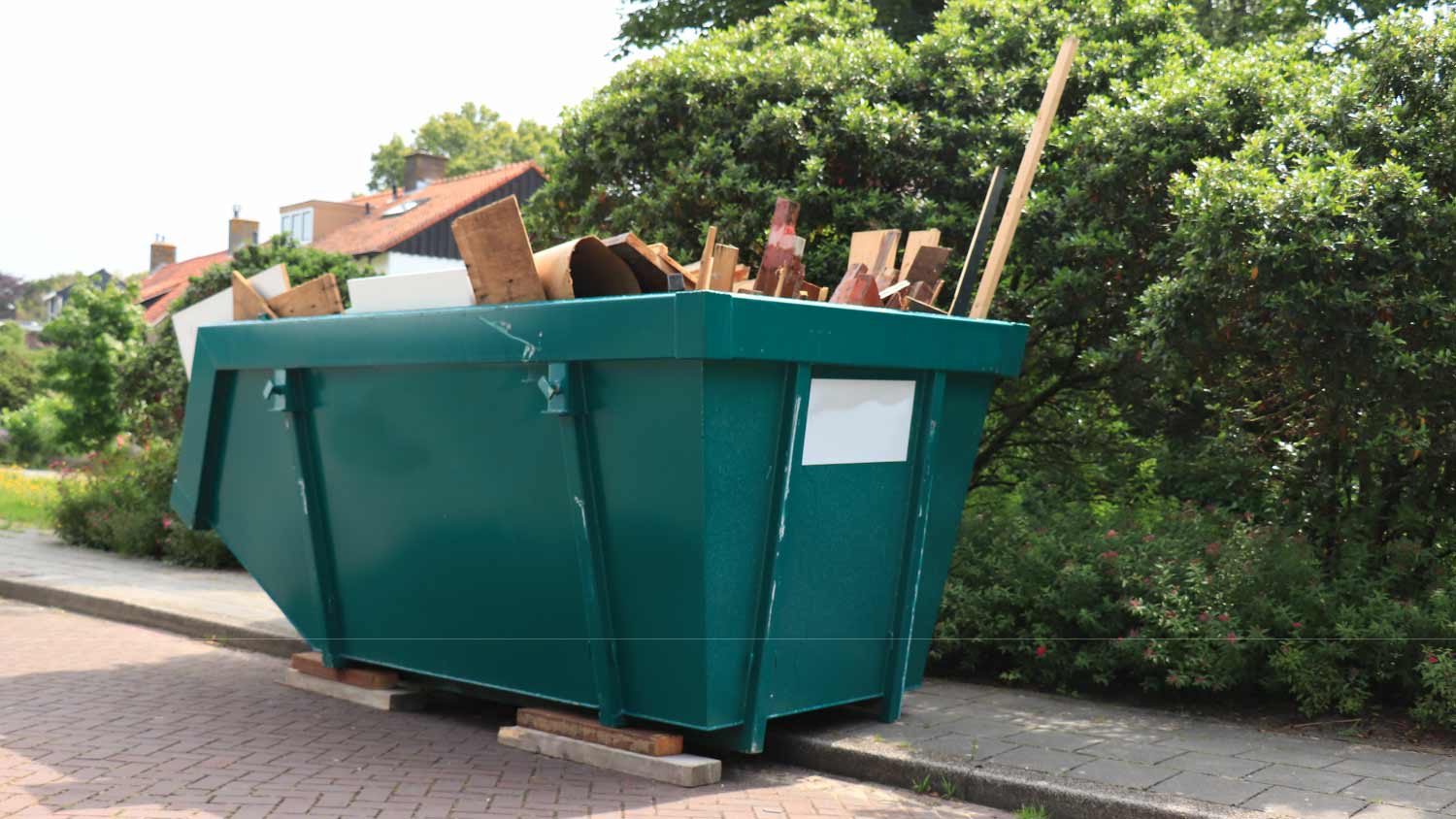 A loaded garbage dumpster