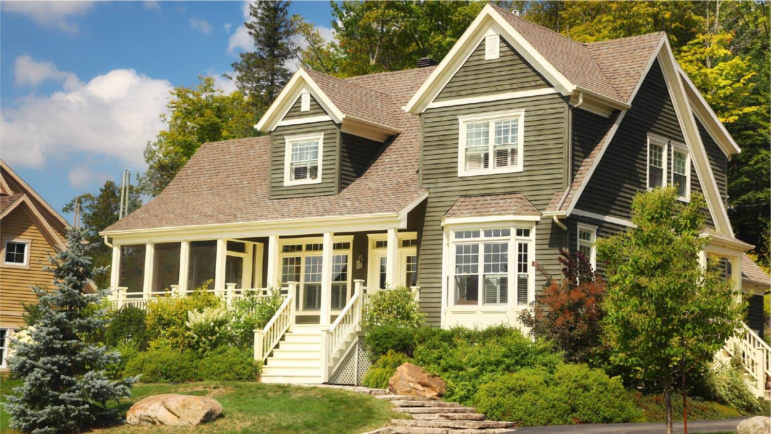 green house with white trim