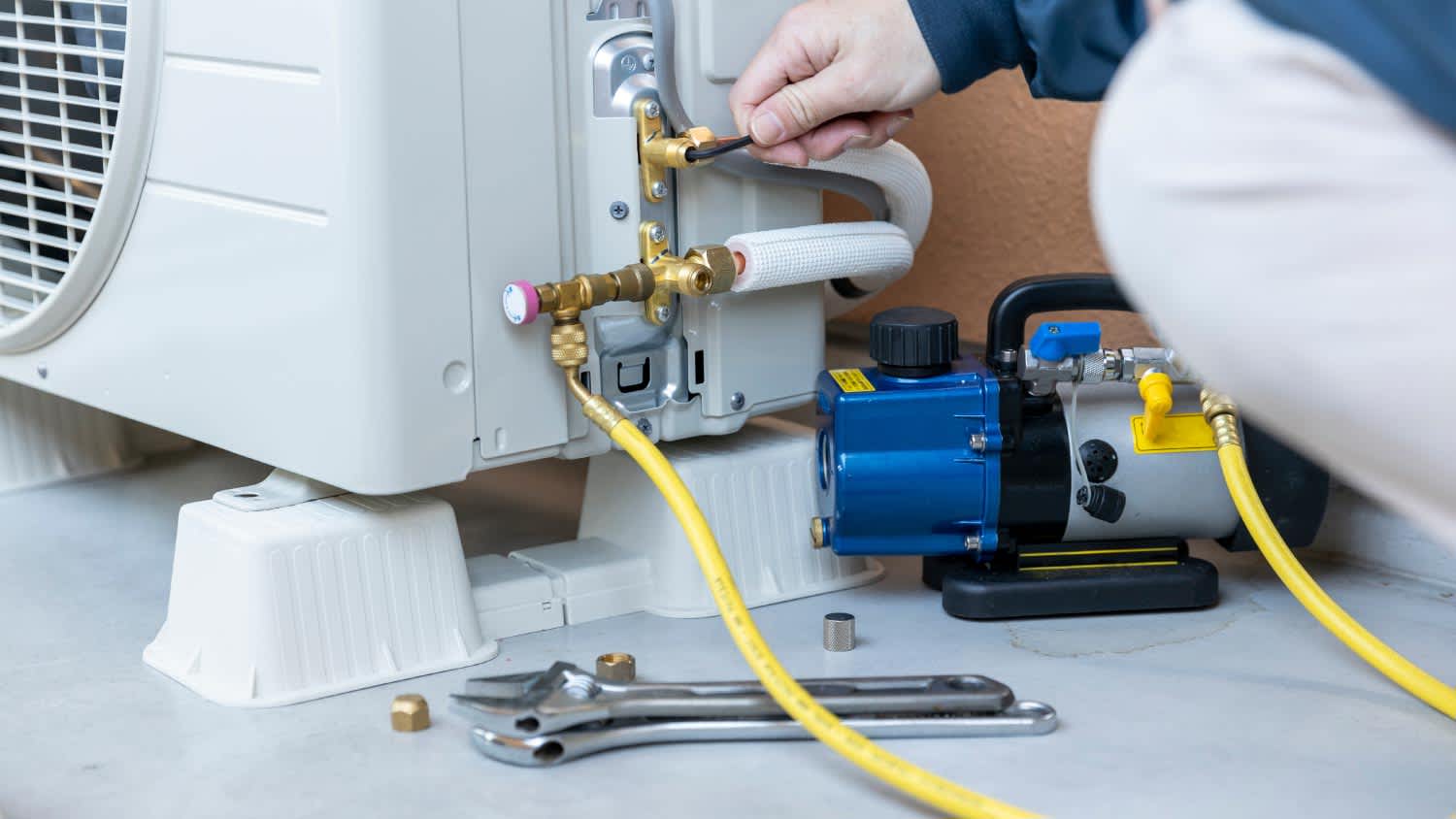 A technician checking the AC