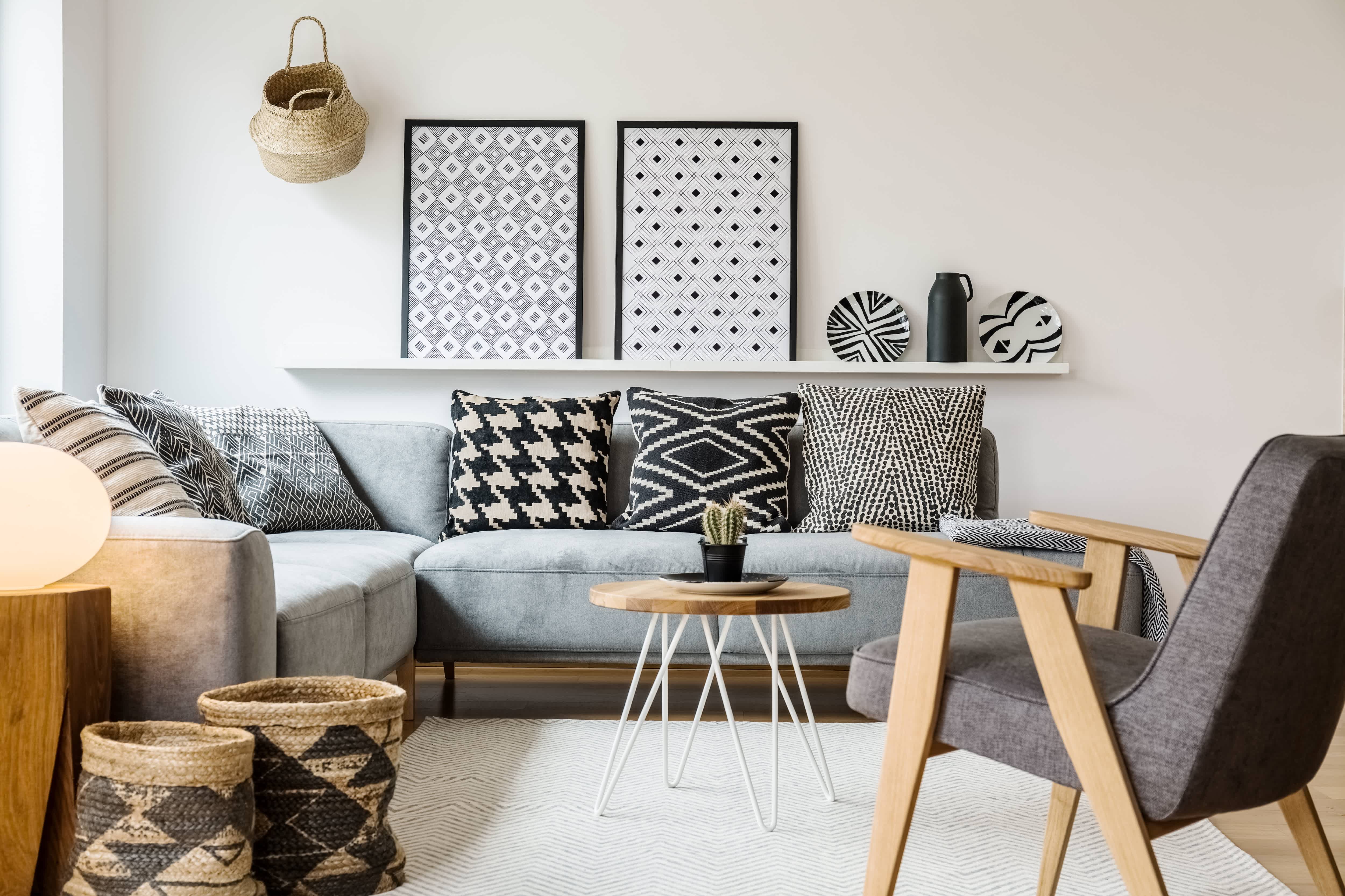 Black, white, and gray living room with accent pillows