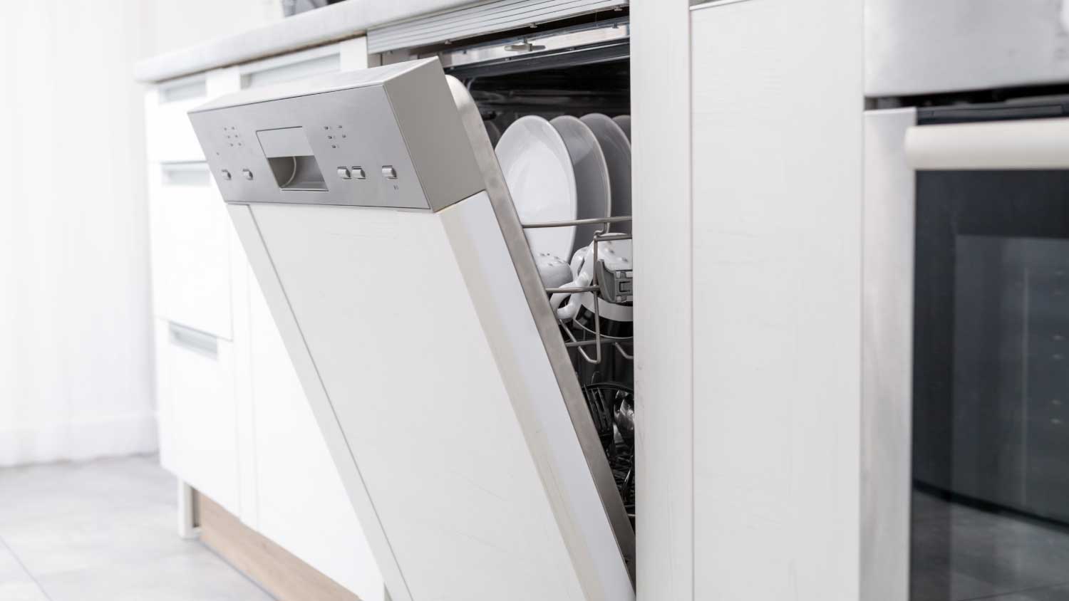 Open dishwasher with clean dishes