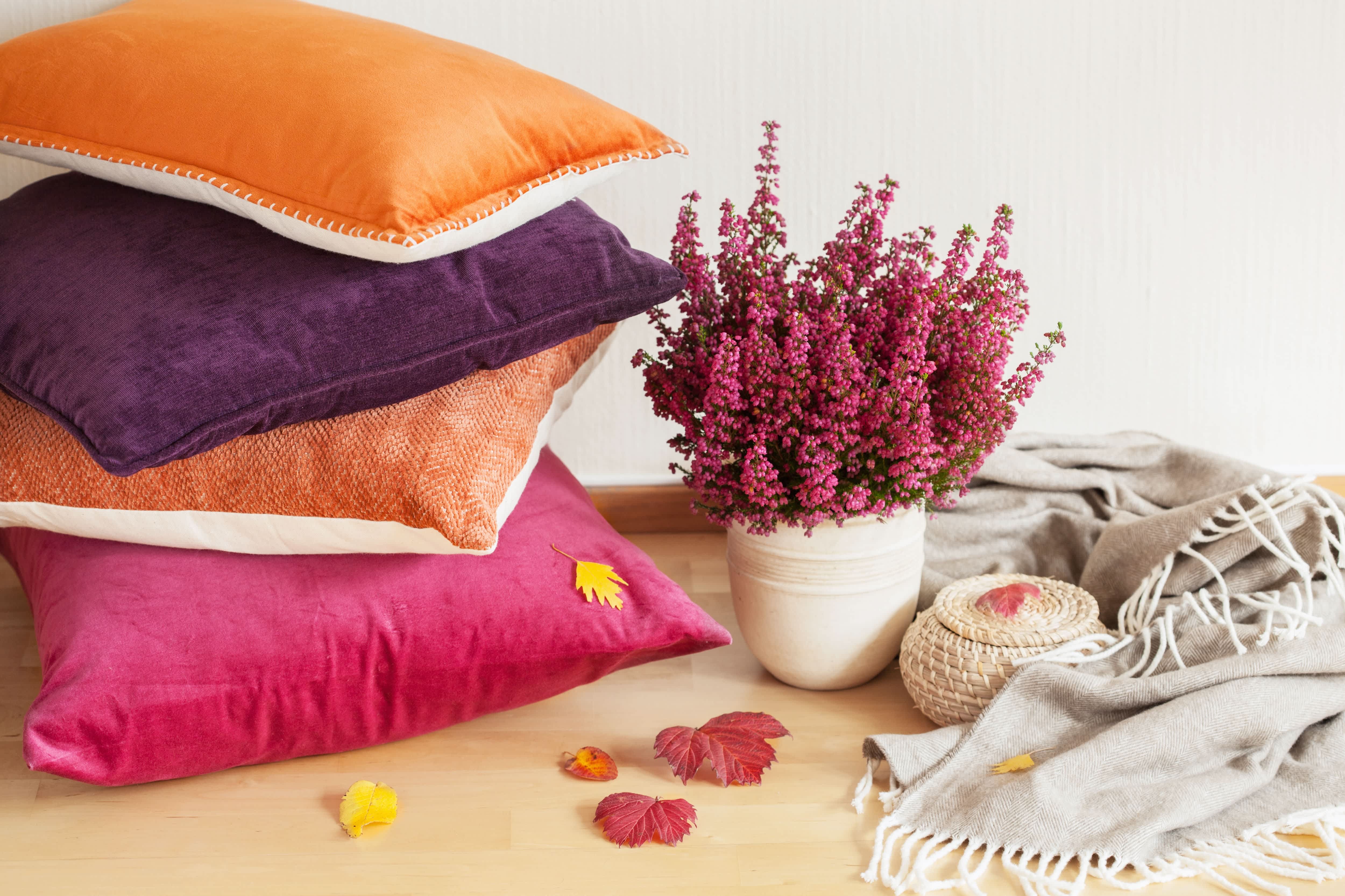 Stacked colorful throw pillows
