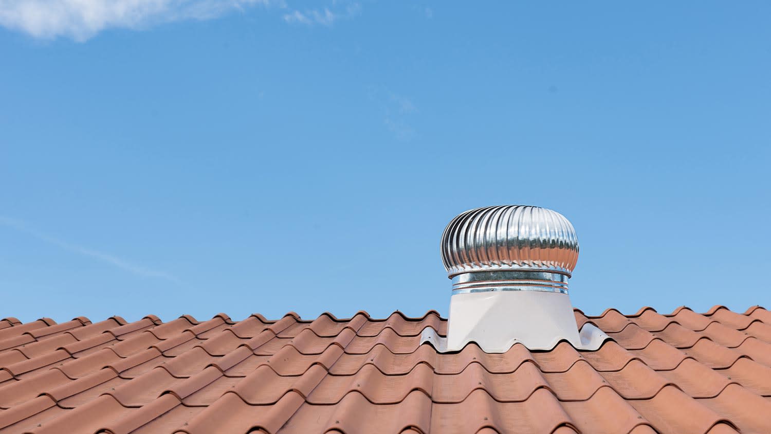 A roof ventilator of an attic fan