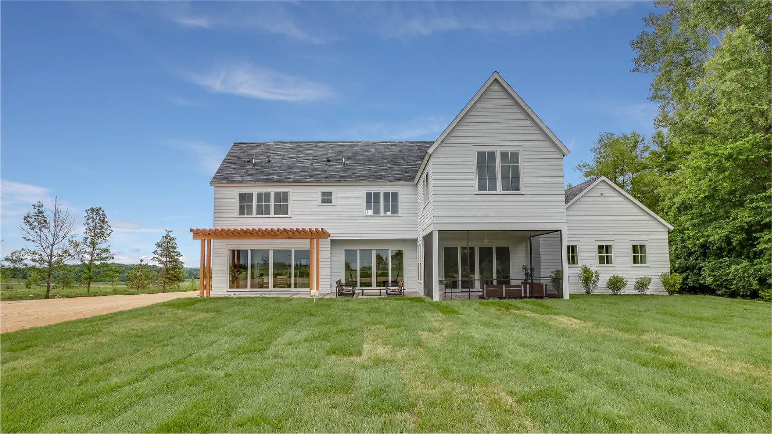 large white house with green lawn