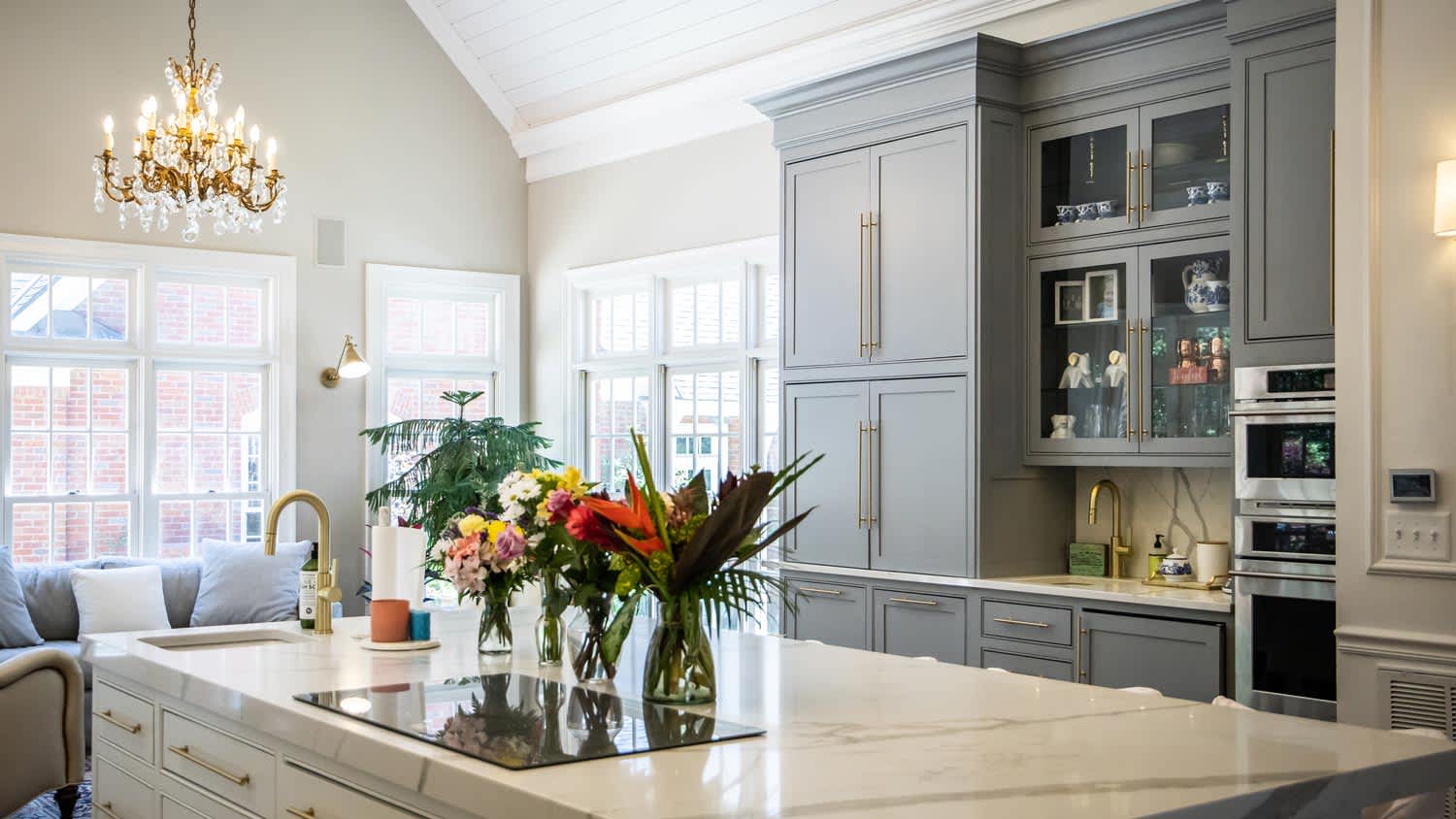 A luxurious and spacious kitchen with a chandelier