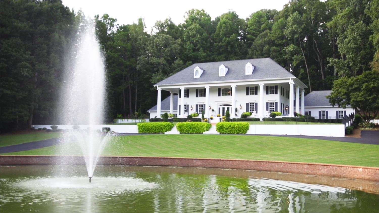 Large mansion with water fountain