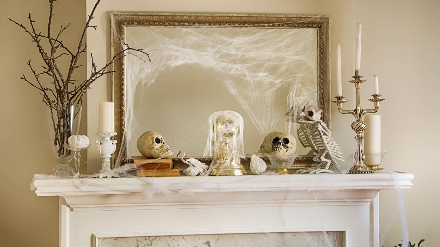 A fireplace decorated for Halloween