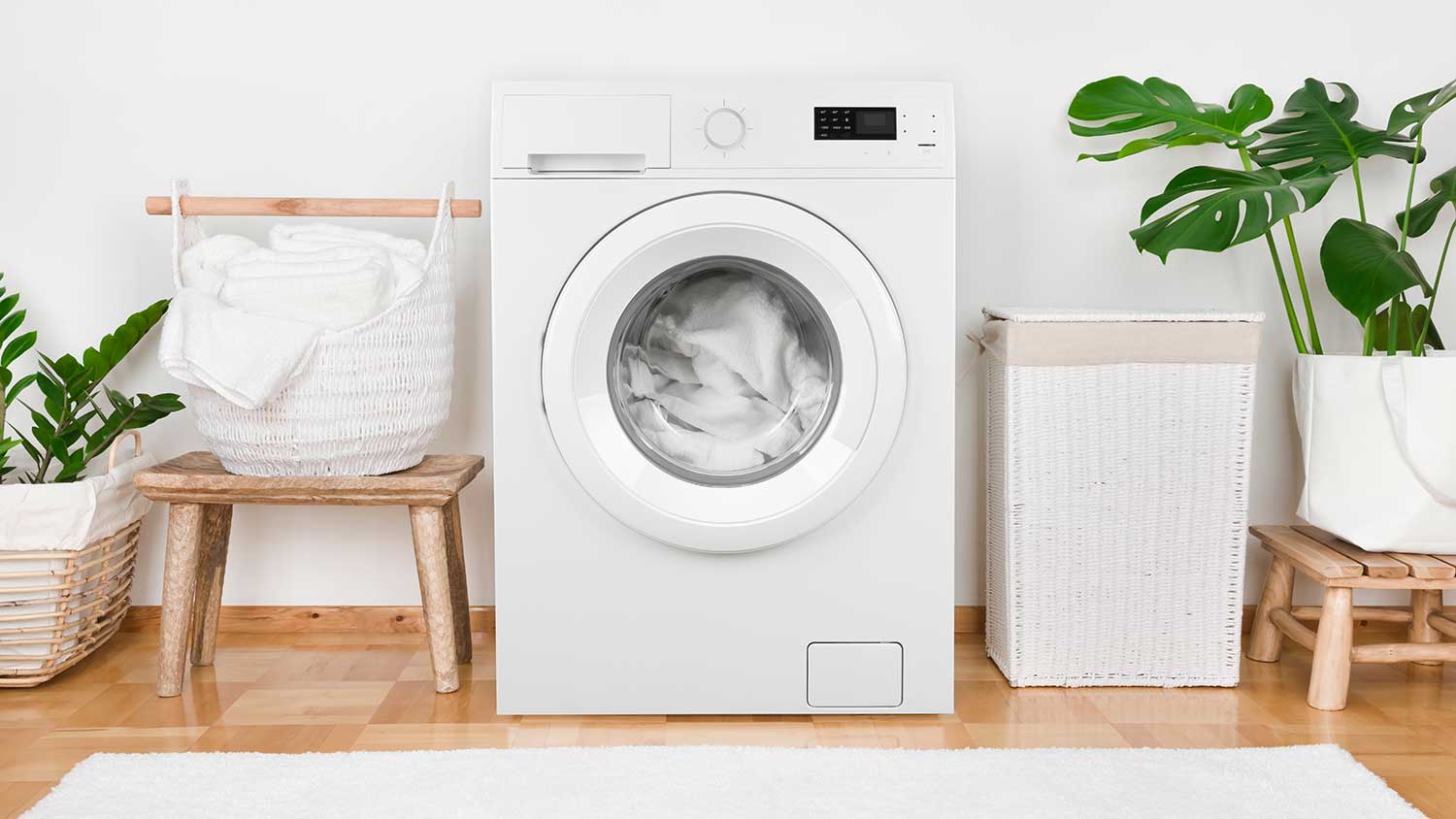 Front load washing machine in a laundry room