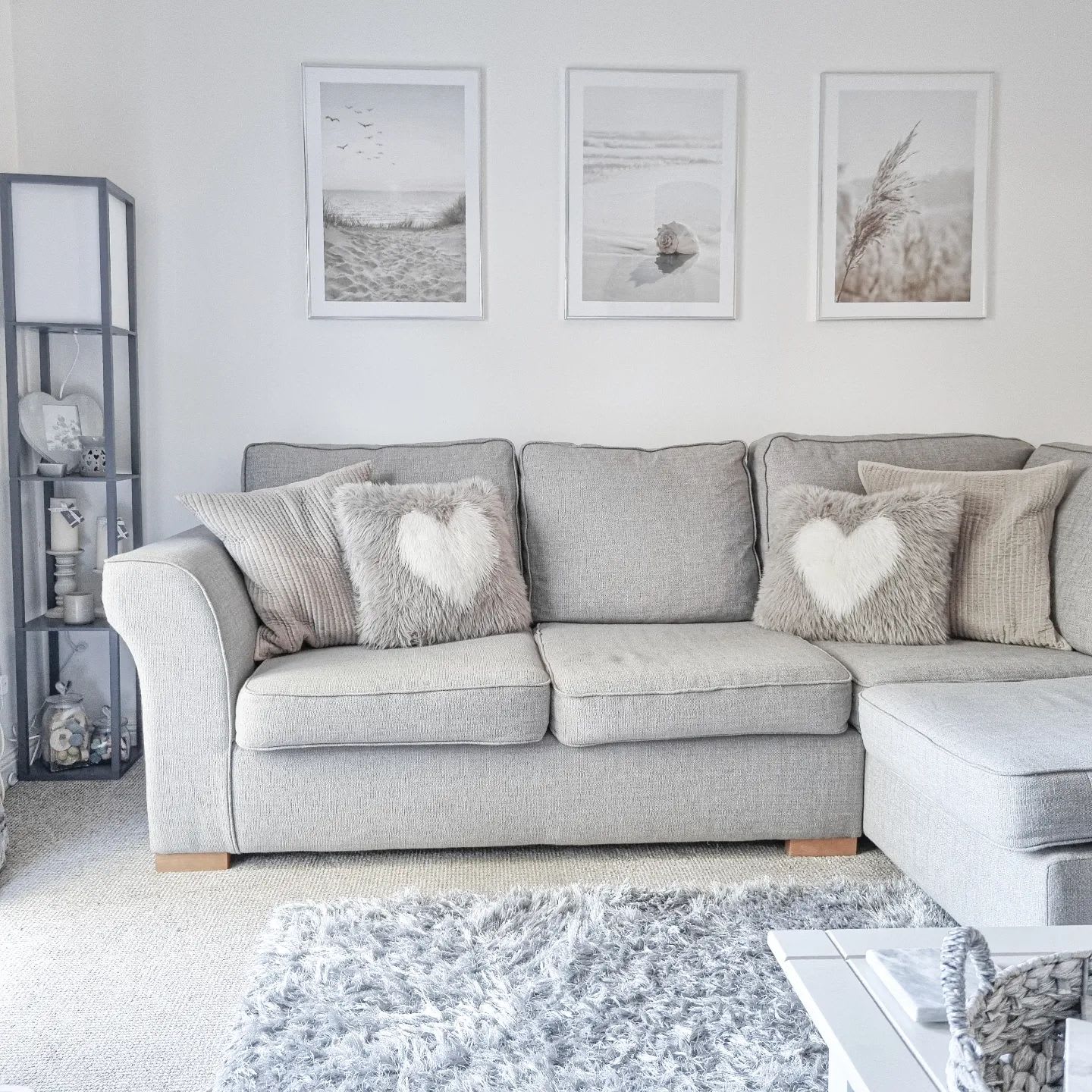 Grey couch with heart pillows