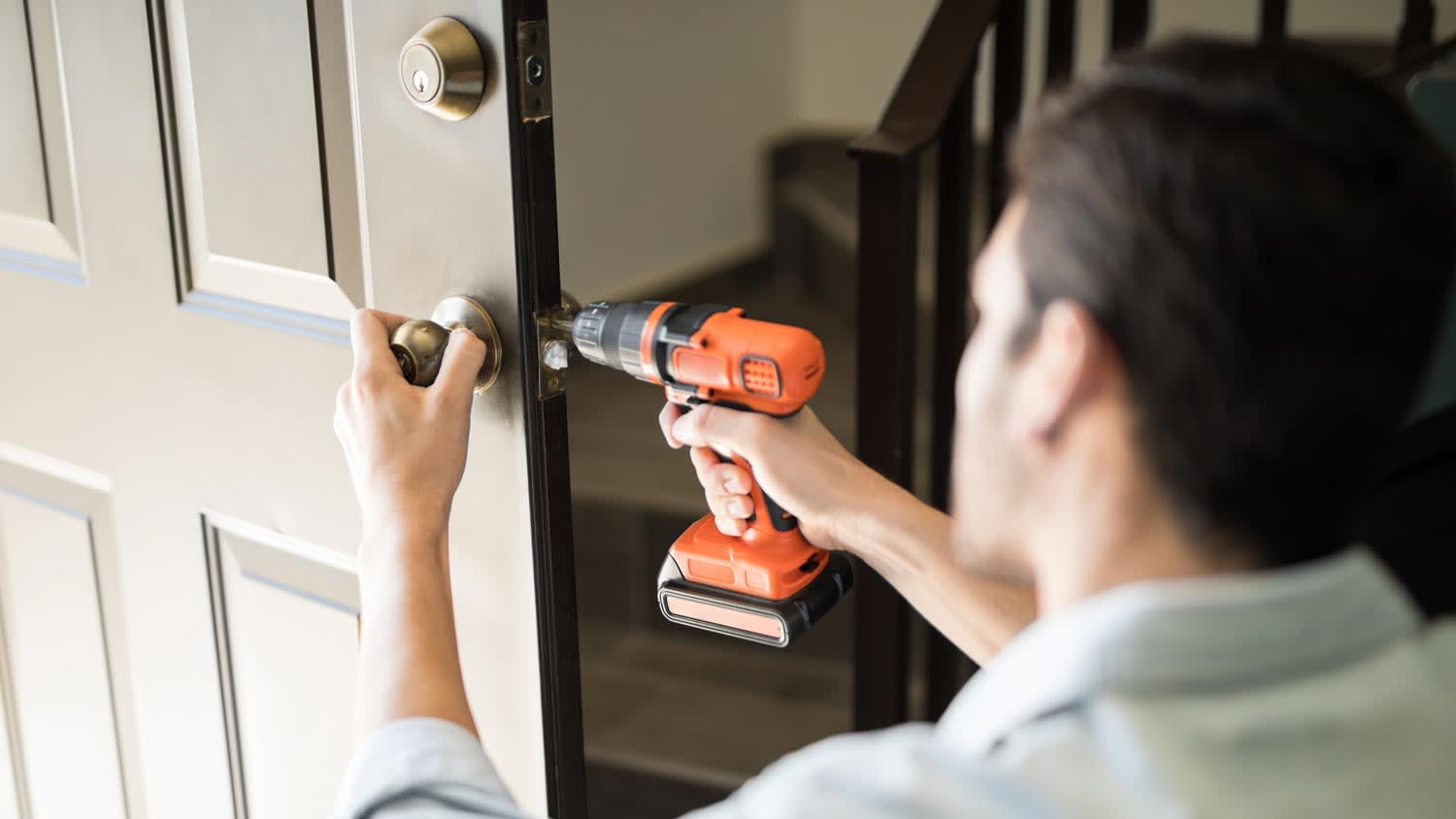 A man rekeying a lock