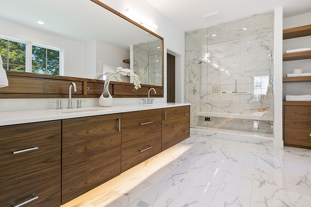 Modern midcentury bathroom with marble tile