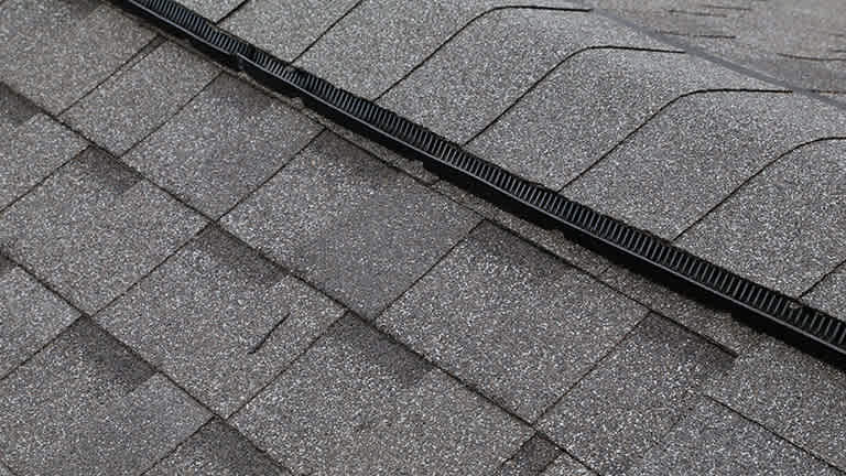 A ridge vent on a roof