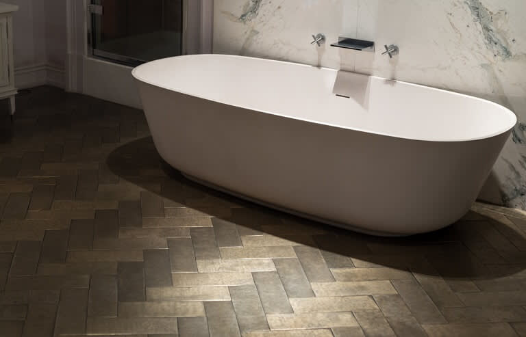 rich wood tile flooring in bathroom