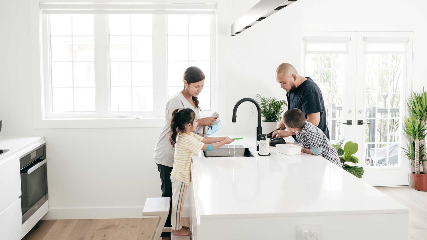 Family keeping a kitchen clean and tidy