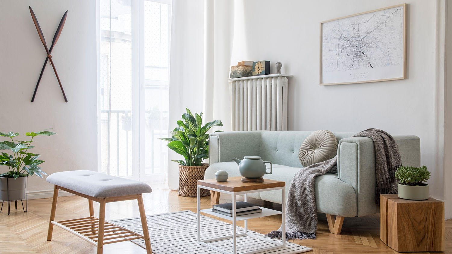 A view of a living room with white walls