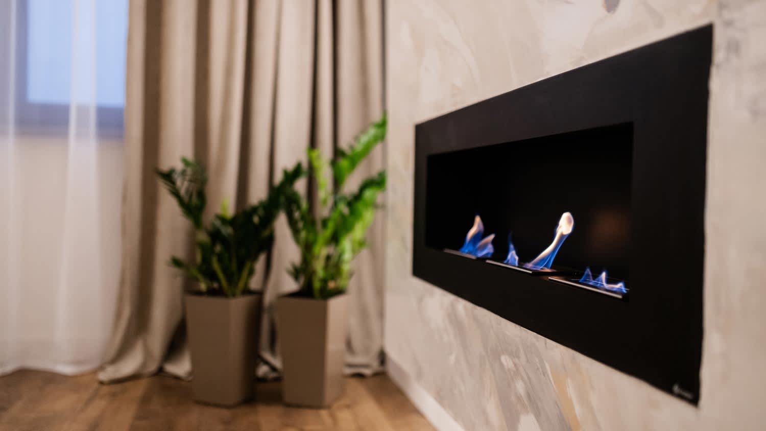 A gas fireplace in a living room