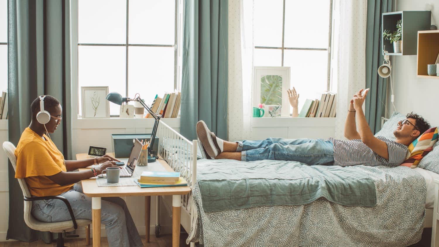 Friends at college dorm room