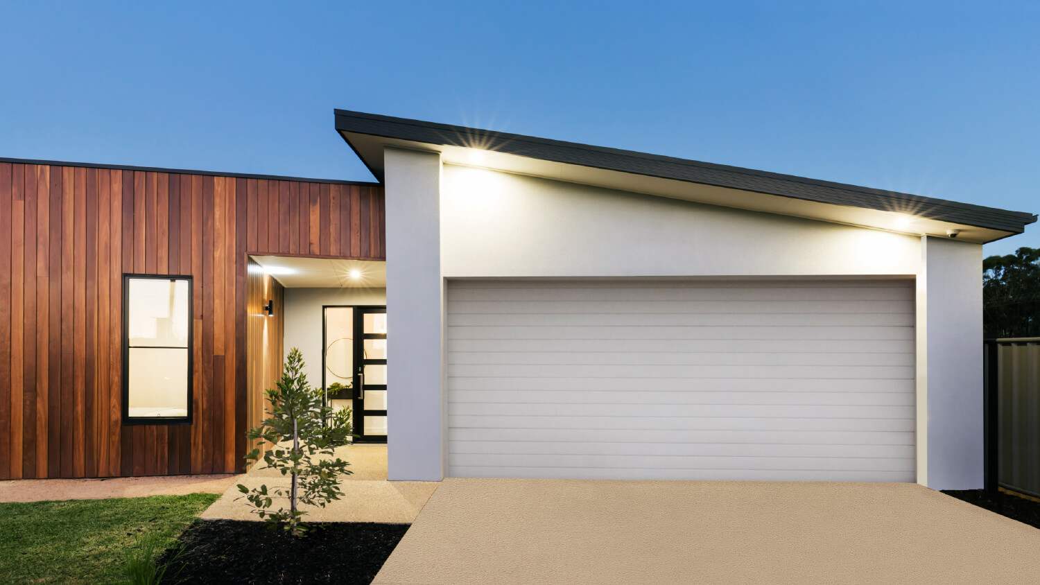 white mid-century modern garage on wooden house