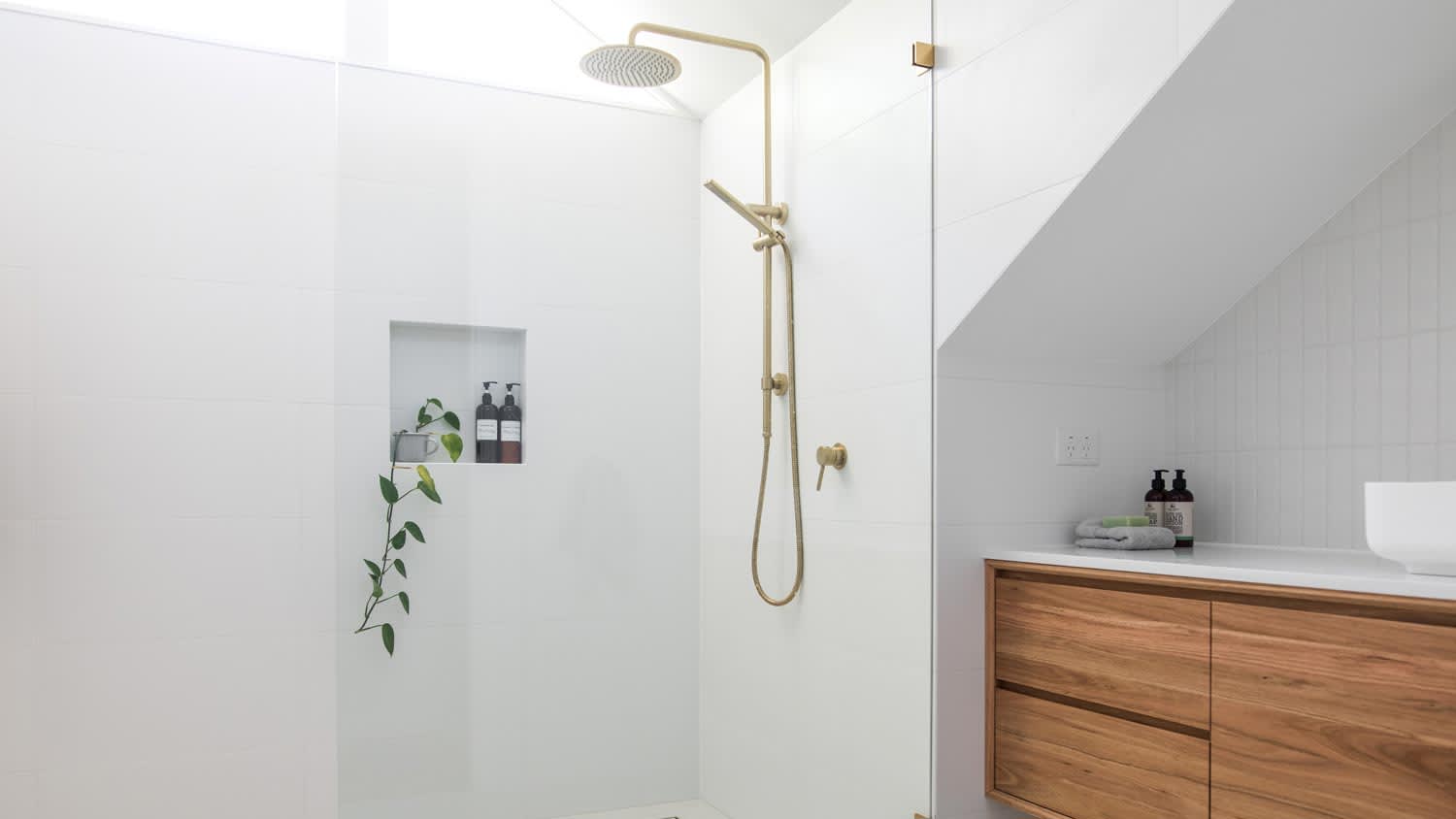 An elegant bathroom with a minimal shower