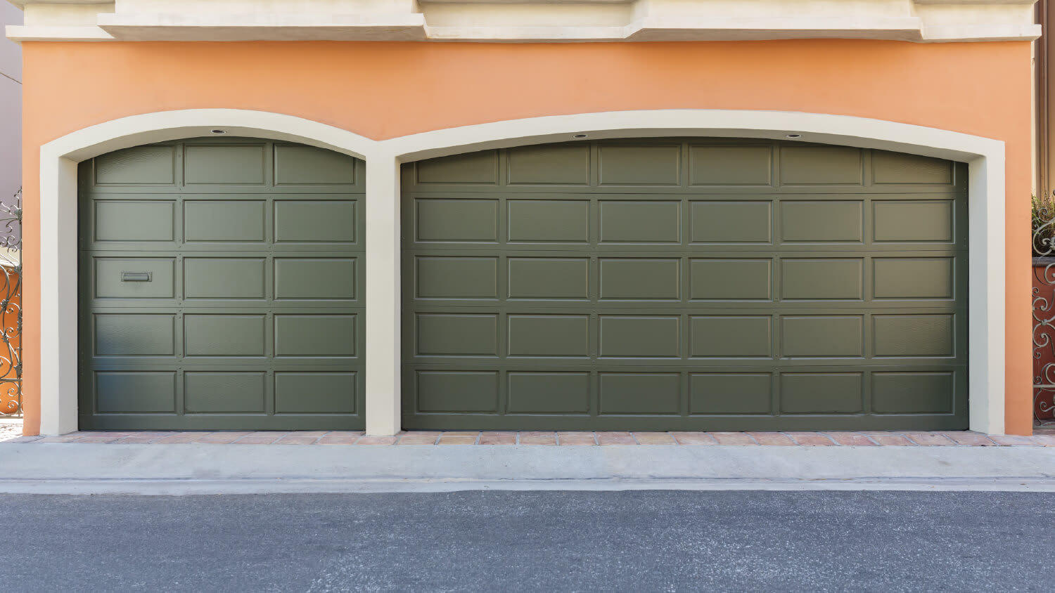 metal garage doors on orange house