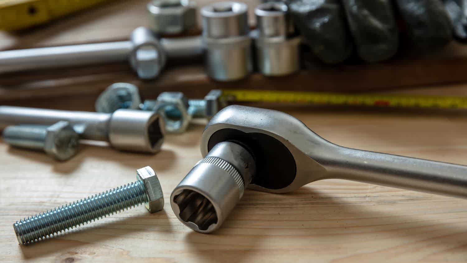 A torque wrench on a wooden surface