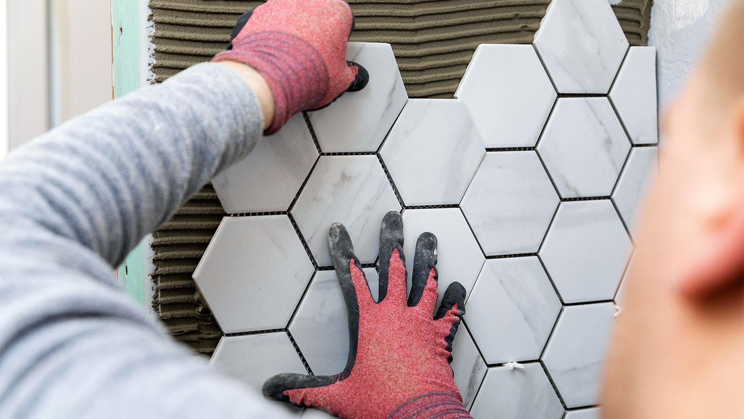 Installing marble tile backsplash