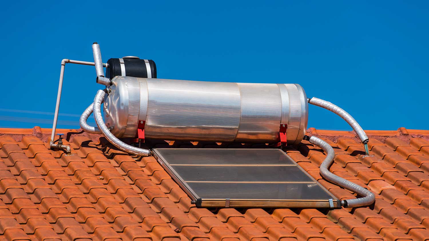 Solar water heater on a house roof